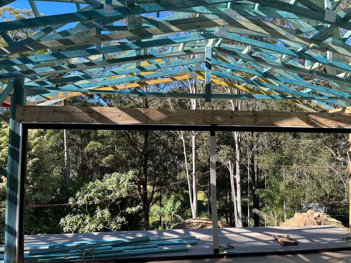 Hip roof trusses over an LVL lintel on a bushland block